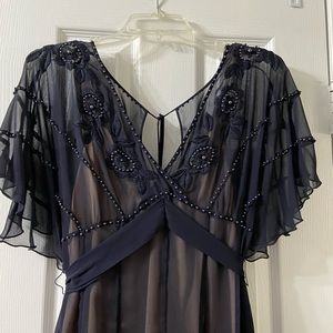 Jeweled Flutter sleeve knee length cocktail dress